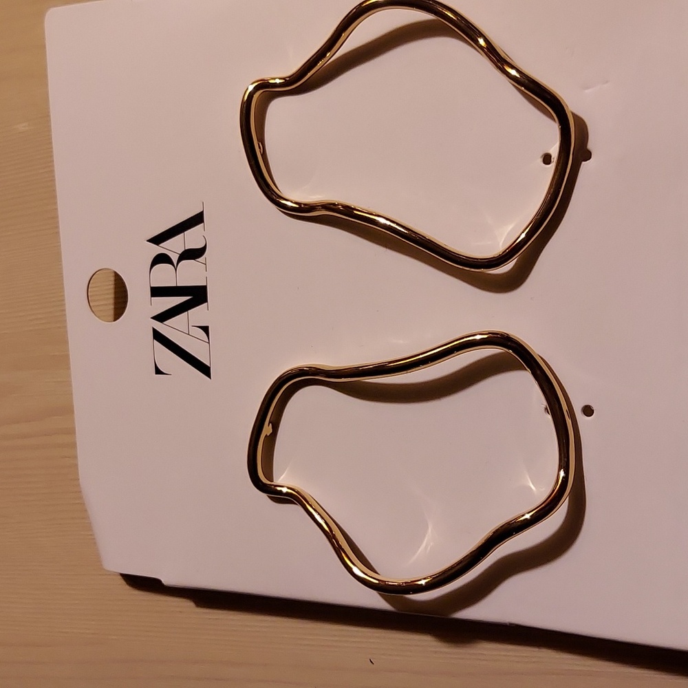 Gold tone earrings